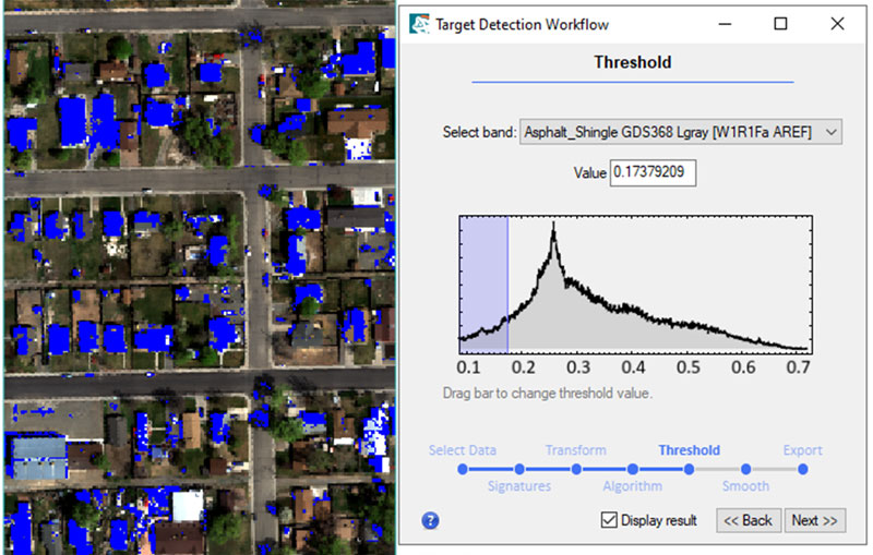 Figure 16: Example of setting a threshold value for a SAM image. Pixels with a closer match to the target spectra are highlighted in blue.